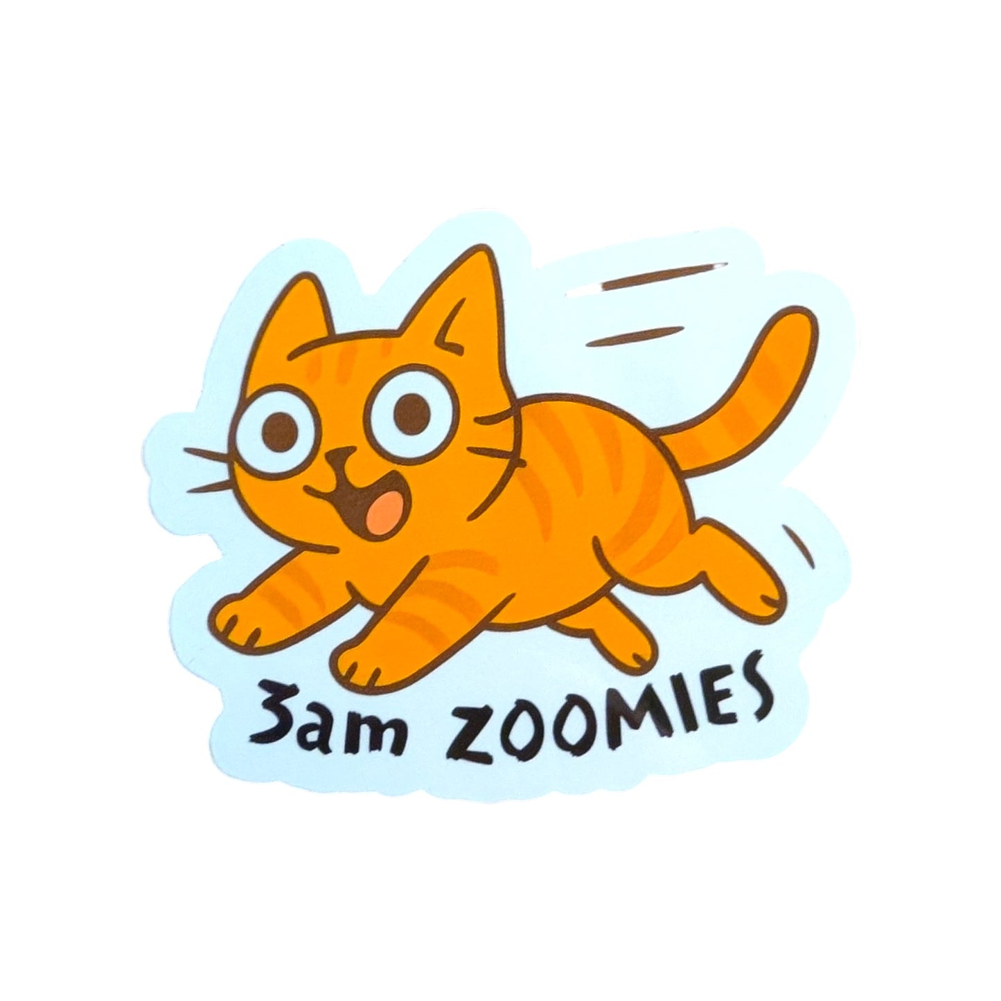 Cartoon cat sticker with '3am Zoomies' text on a white background