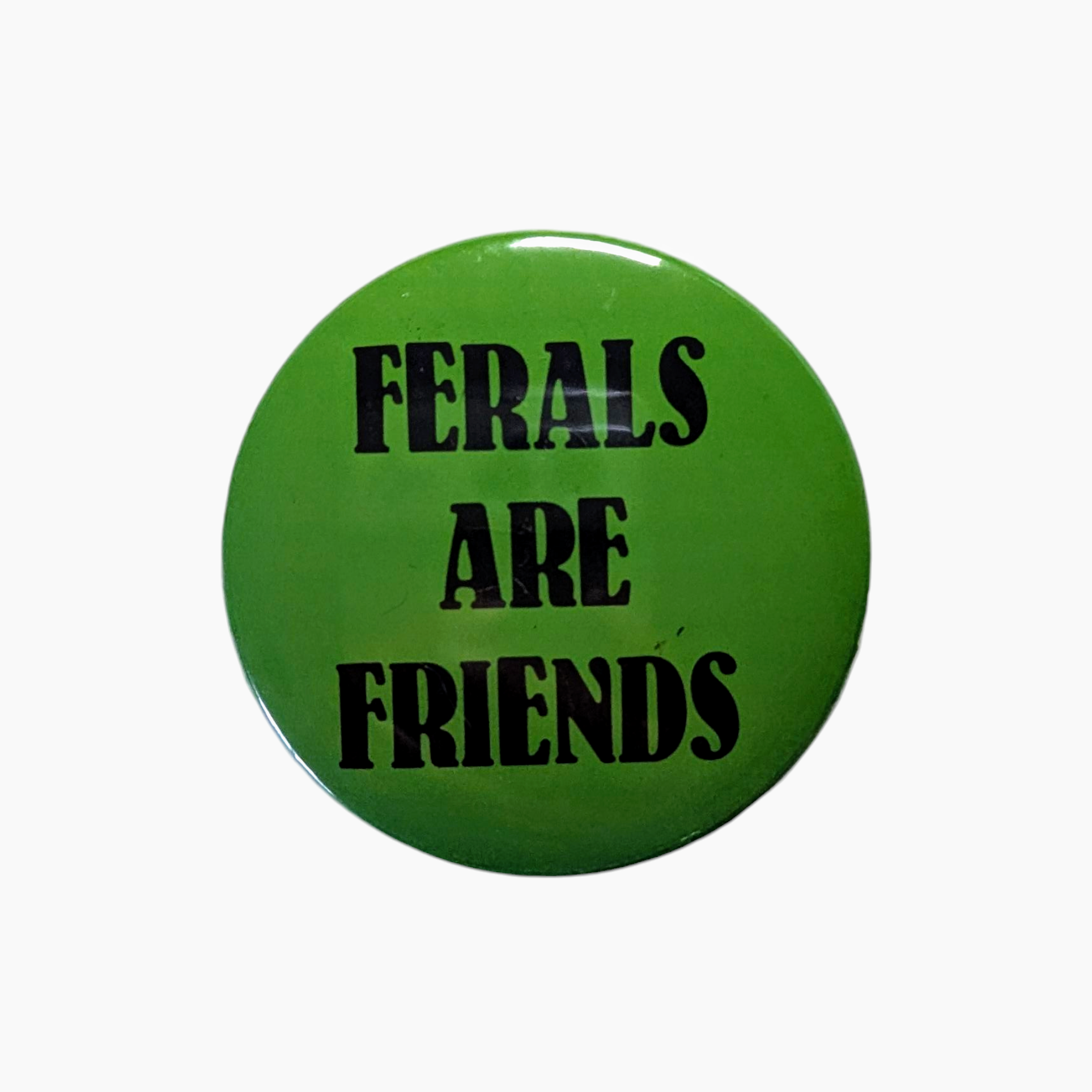 Green button with 'FERALS ARE FRIENDS' text on a white background