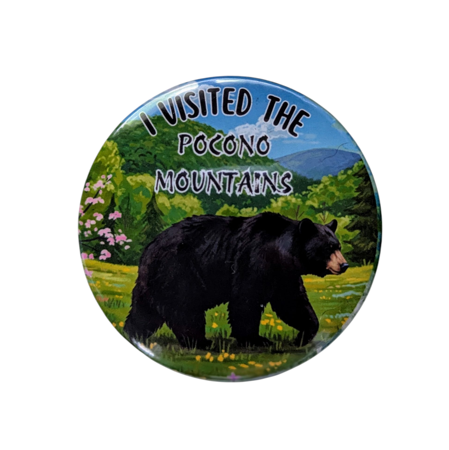 Button badge with a bear and scenic Pocono Mountains text on a white background