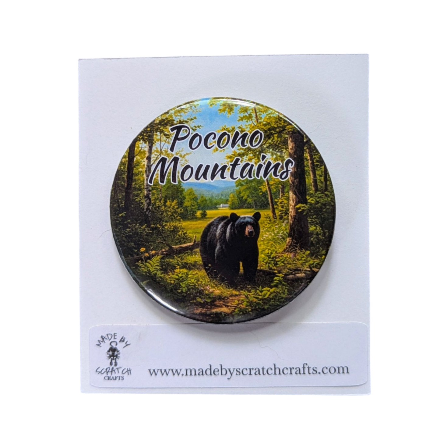 Button badge with a bear in a forest and 'Pocono Mountains' text, on a white card with Scratch Crafts branding.