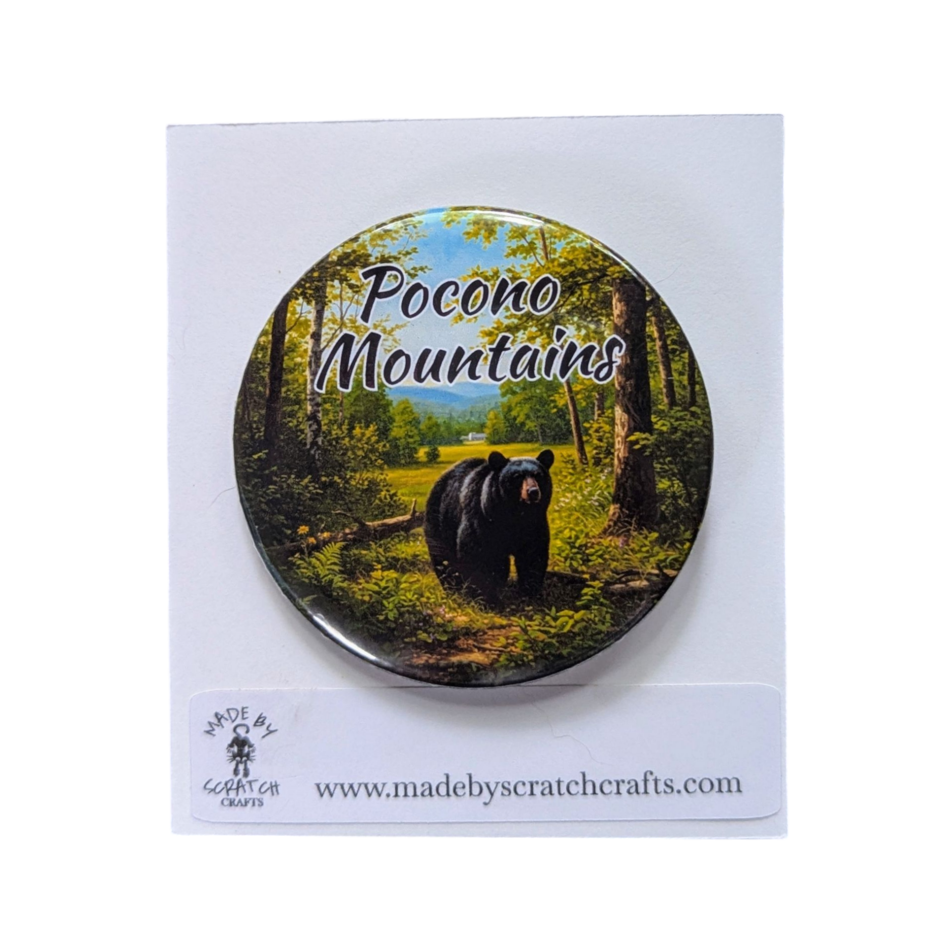 Button badge with a bear in a forest and 'Pocono Mountains' text, on a white card with Scratch Crafts branding.