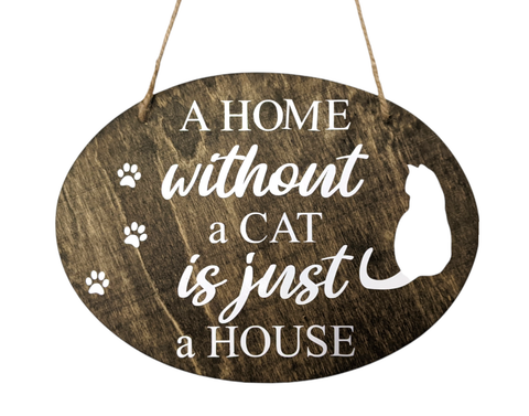 A Home Without a Cat is Just a House Sign: Add charm to your home with this oval wood sign expressing love for cats. Ready to hang, it complements any decor, measuring approximately 7.75 inches by 5.5 inches. Perfect for cat enthusiasts, it adds personality to any room and serves as a delightful reminder of your feline affection.
