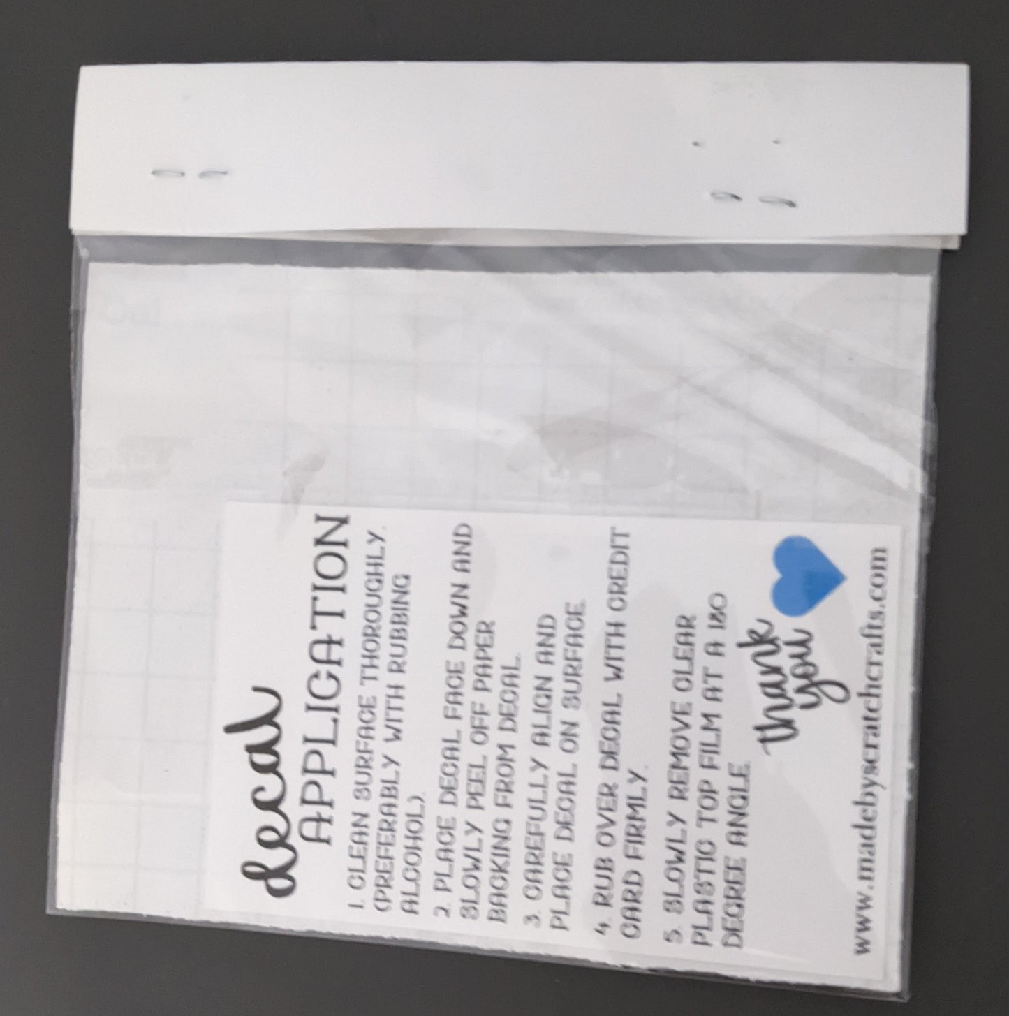 Back of All I Need is Coffee and My Cat car decal packaging with application instructions