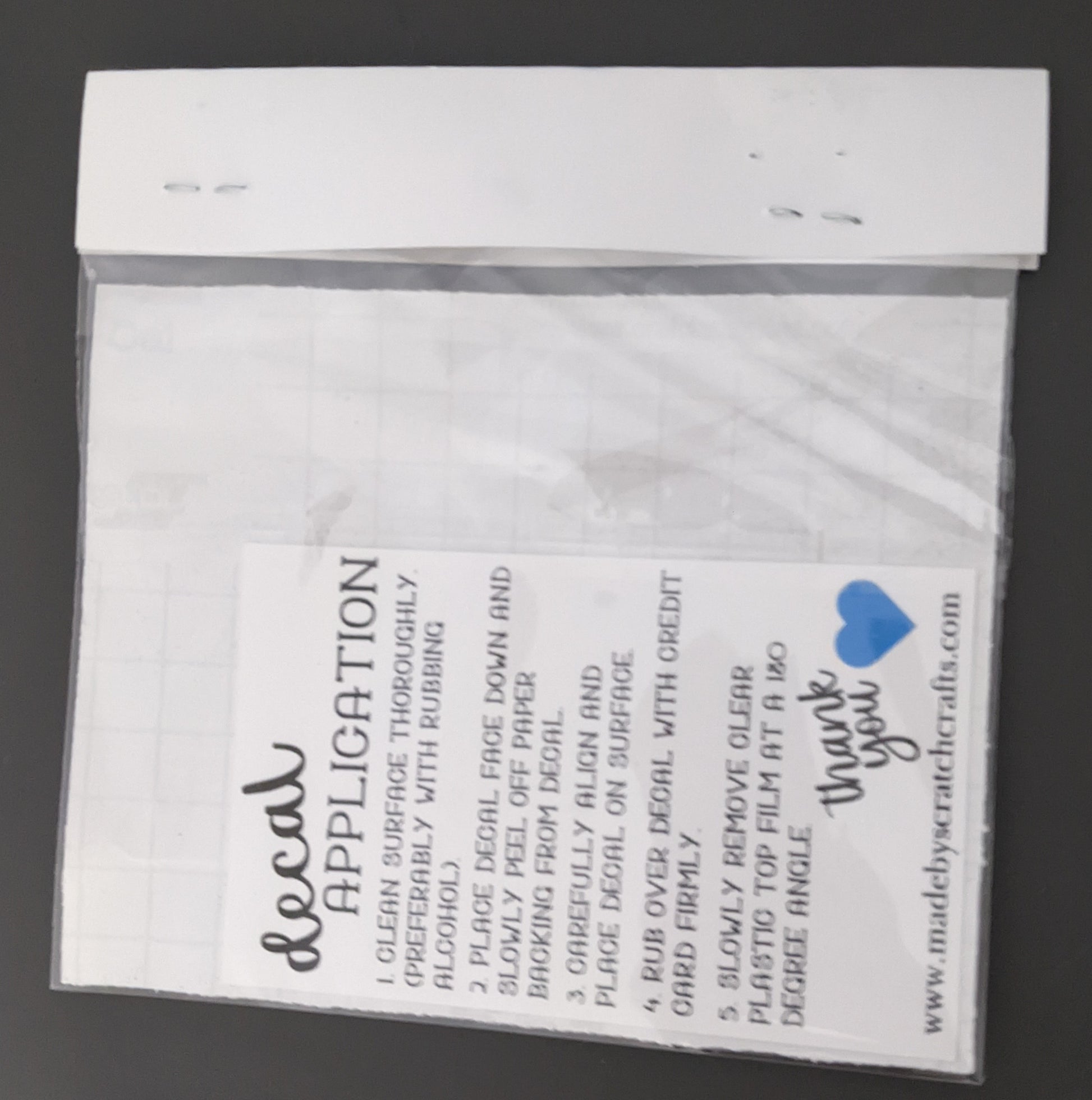 Back of All I Need is Coffee and My Cat car decal packaging with application instructions