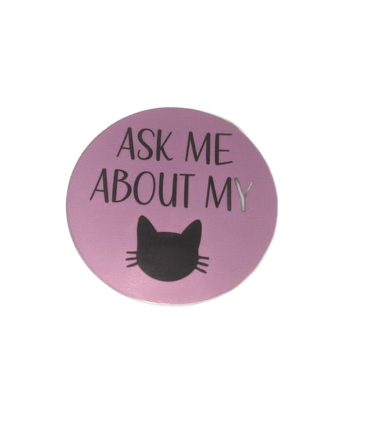 Ask Me About My Cat Acrylic Pin: Express your love for your feline friend with this round acrylic lapel pin. Measuring 1.5 inches in diameter, pin it to your clothes, backpack, or hat to proudly proclaim your cat obsession. Just kidding, don't pin it to your cat's collar! Be prepared for people to stop and ask about your cat when they see this pin.