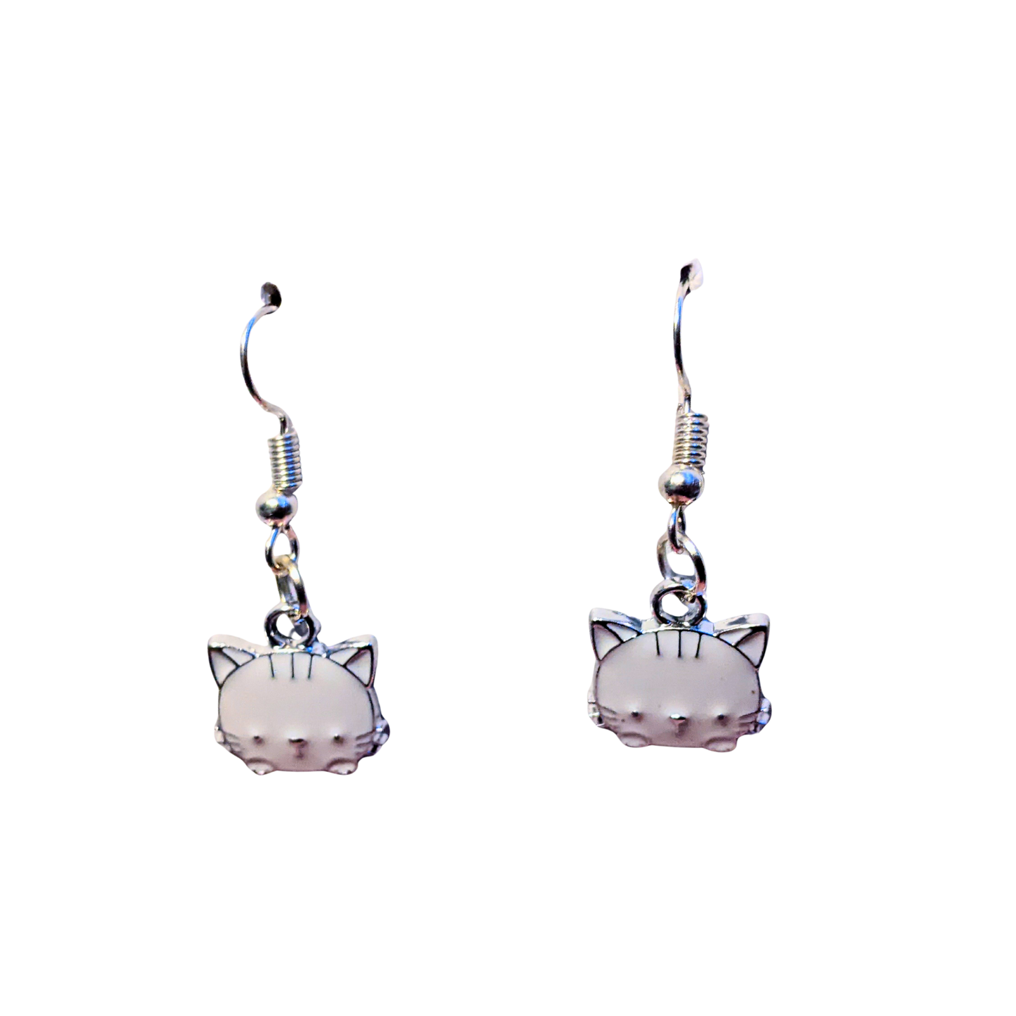 Cat-shaped earrings on a white background