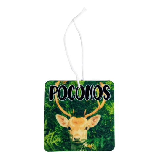 Car air freshener with a deer design and 'Poconos' text on a green background