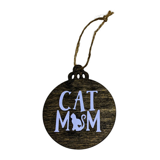 Round wooden ornament with 'Cat Mom' text and a cat silhouette on a white background