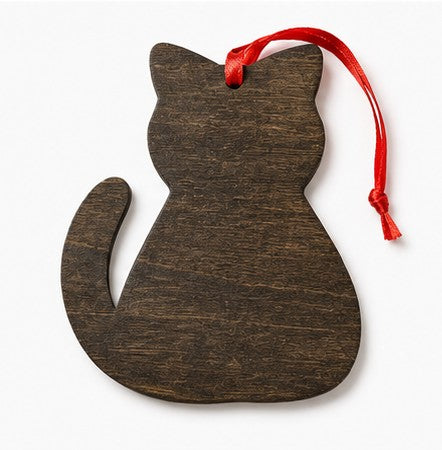 A dark brown wooden cat-shaped ornament with a red hanging ribbon, shown on a plain white background.
