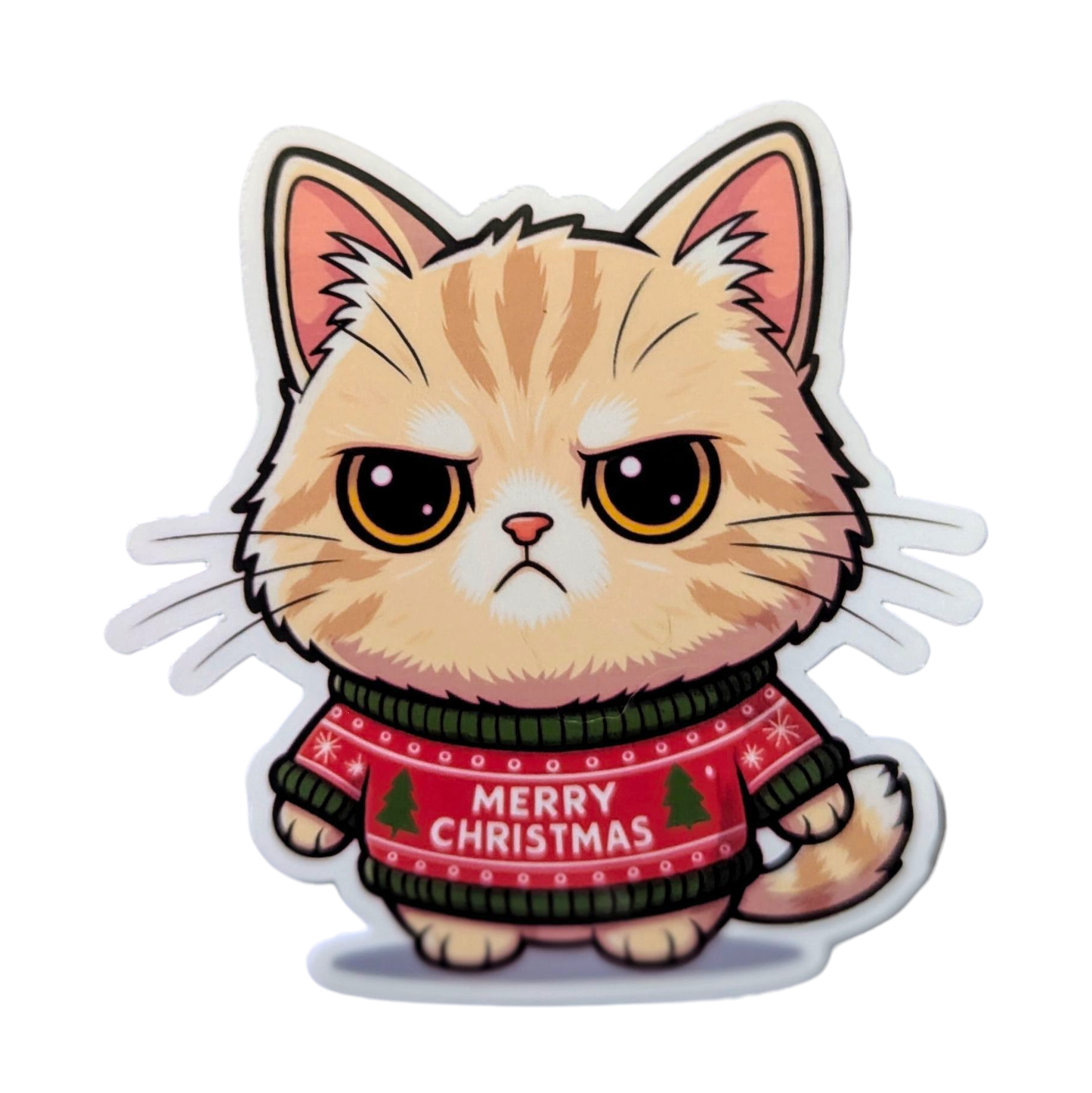 Sticker of Cartoon cat in a an ugly sweater that says 'Merry Christmas'  on a white background