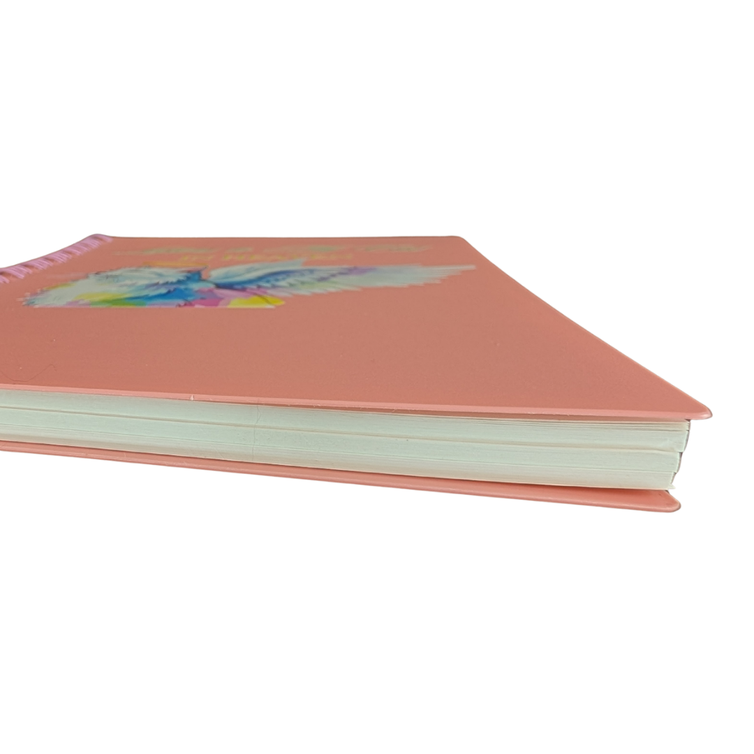 Pink notebook with a colorful design on the cover against a white background