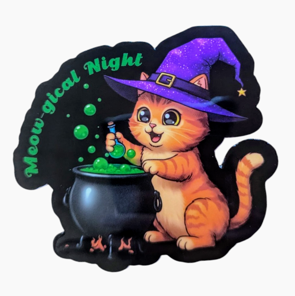 A vinyl sticker featuring an orange tabby cat dressed as a witch with a purple hat, sitting next to a black cauldron, with the text 'Meow-gical Night' above.