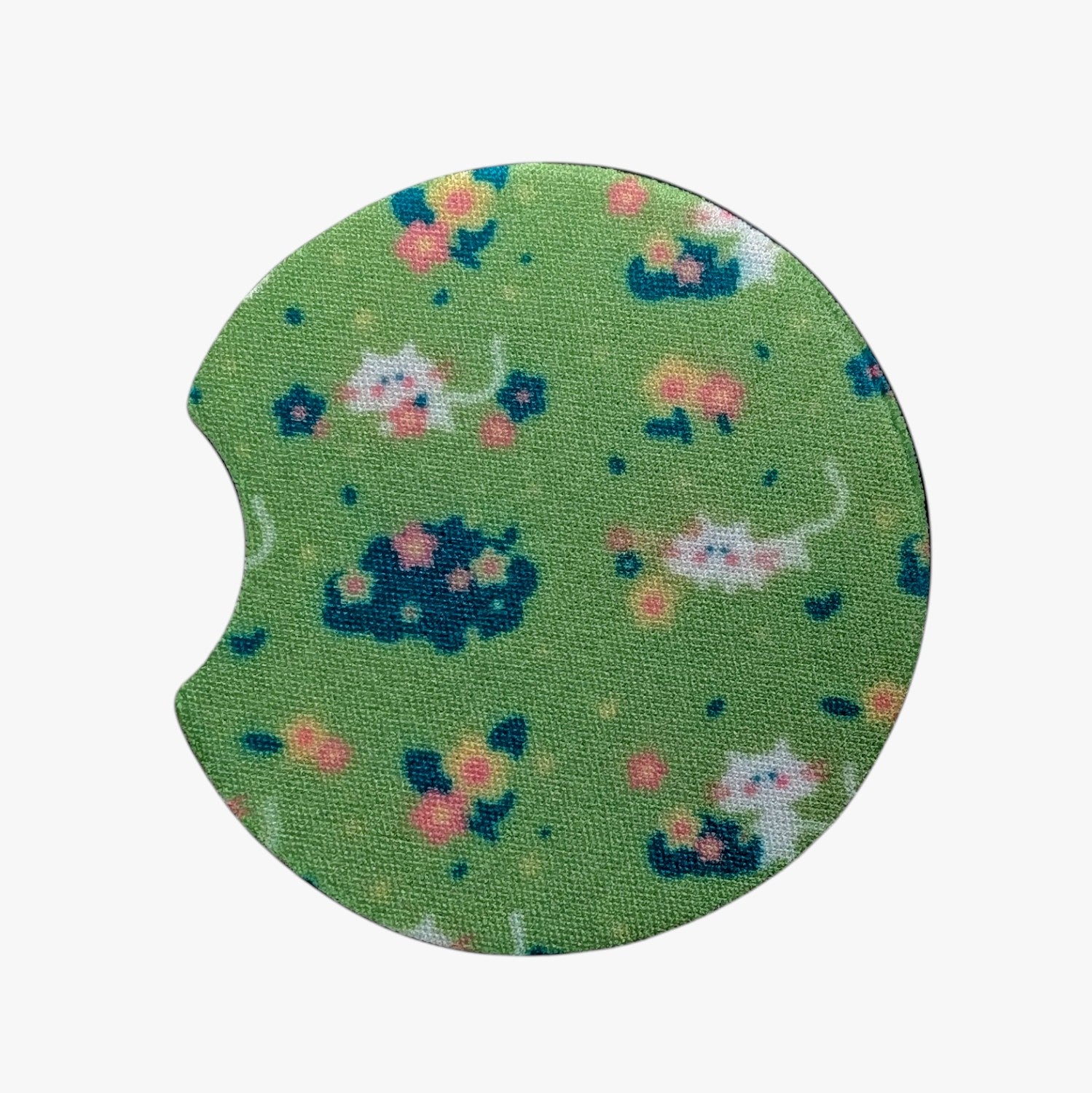 Green car coaster with cat and flower pattern on a white background