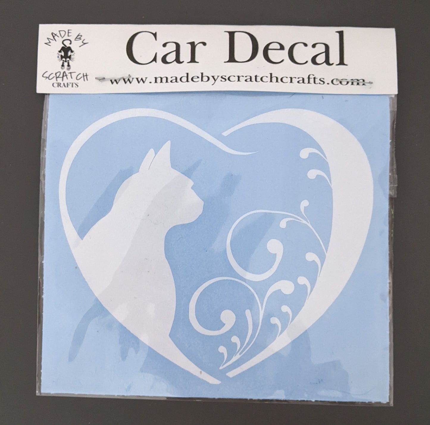 cat heart car decal by made by scratch crafts in clear packaging