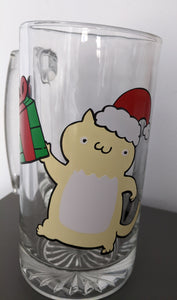 sturdy glass beer mug/stein with cat in santa hat holding a present