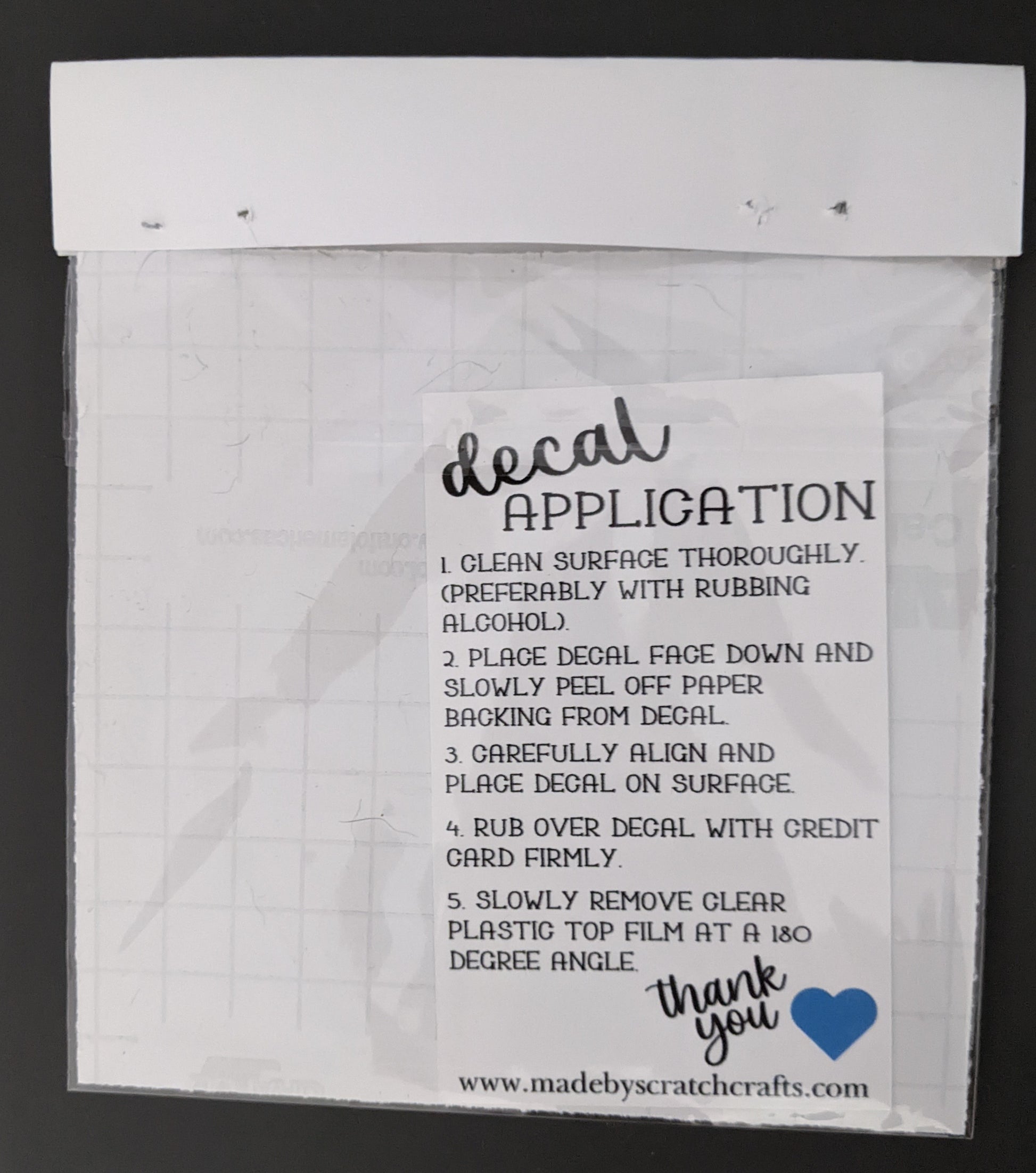 back of cat yin yang car decal packaging with application instructions